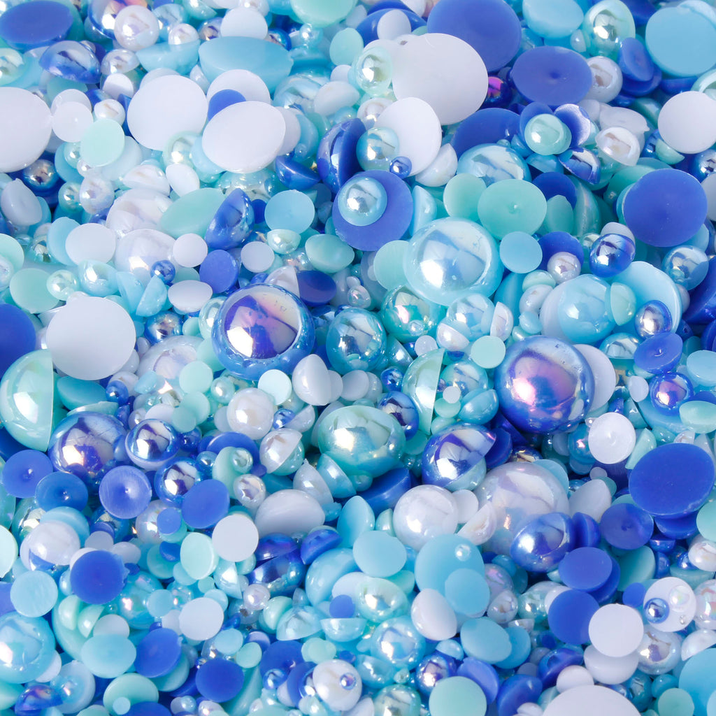 A mix of Iridescent Indigo, Blue and White pearls. Pearl size 2mm - 12mm.