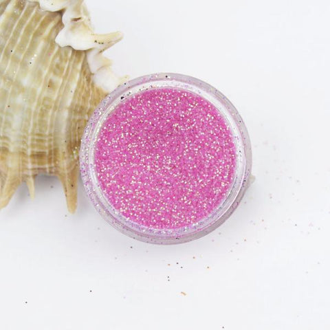 evol translucent iridescent fierce pink dust face glitter